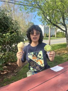 Picture of Gabby holding 2 ice cream cones
